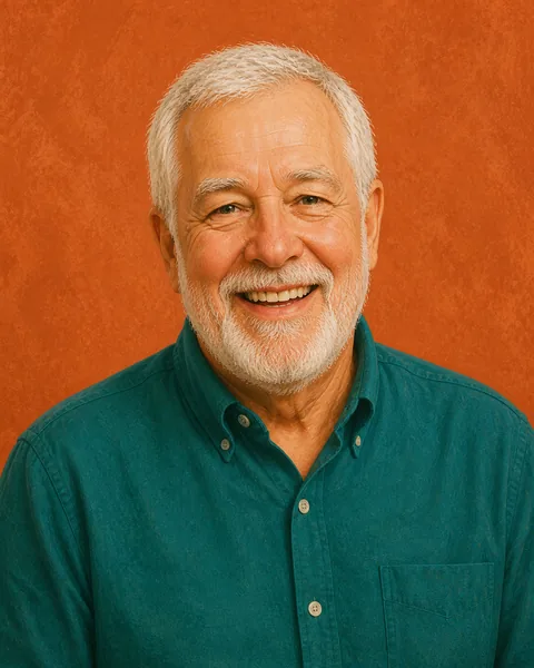 Drawn portrait of an older man with white hair and beard in a deep-patina shirt, smiling gently